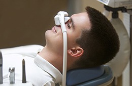 Man relaxing with nitrous oxide dental sedation in Concord