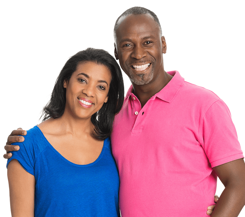 husband and wife smiling