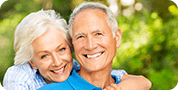 elderly couple smiling