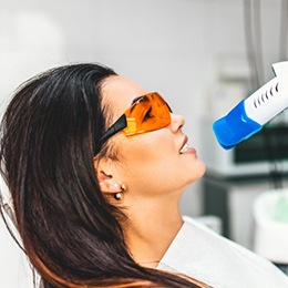 Female patient receiving in-office teeth whitening 