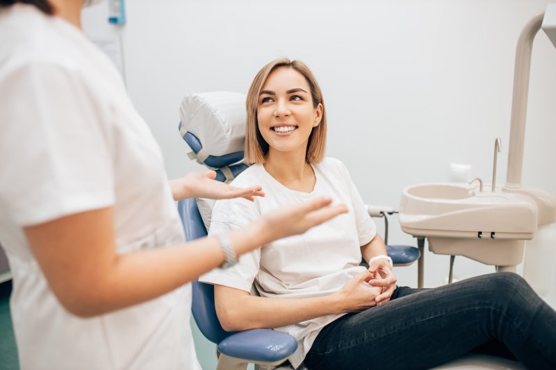 Woman smiling at dentist appointment
